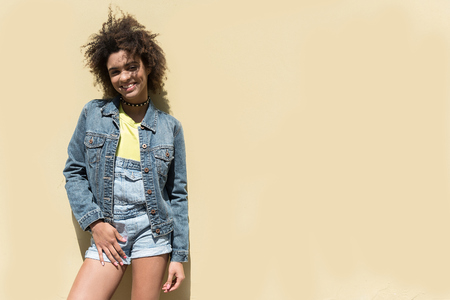 Charming young woman is expressing happinessの写真素材