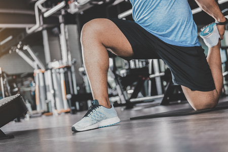 Man practicing sports in cozy gymの写真素材