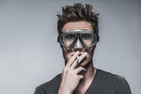 Frightened guy has nicotine addiction