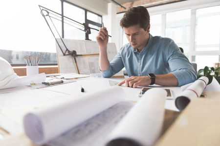Professional architect is working in officeの写真素材