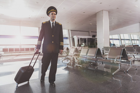 Adult airman returning from flightの写真素材