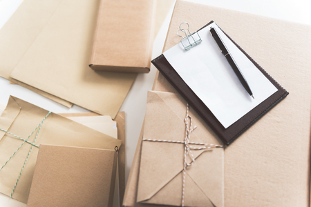 Invoice and packages are on deskの写真素材