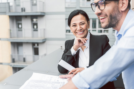 Happy smiling real estate agent doing her jobの写真素材