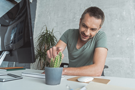Bristled businessman is expressing gladnessの写真素材
