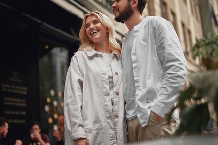 Attractive couple is looking confident while walkingの写真素材