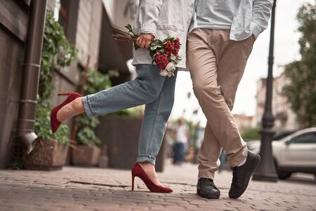 Romantic man and woman are standing together in the cityの写真素材