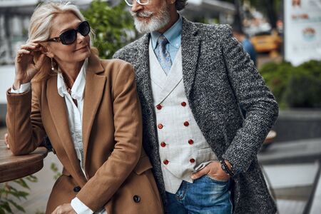 Calm mature woman outdoors with husband stock photoの写真素材