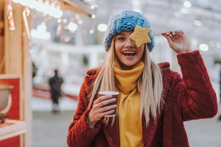 Amazing blonde girl looking straight on cameraの写真素材