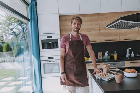 Cook getting ready for preparing his breakfastの写真素材