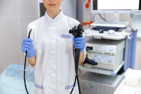 Female physician with endoscopy equipment stock photoの写真素材