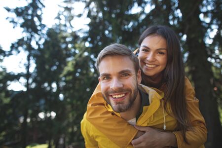 Traveler couple enjoying journey in green forestの写真素材