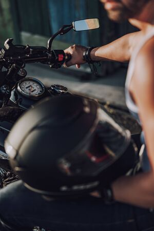Cropped photo of adult male ready for riding stock photoの写真素材