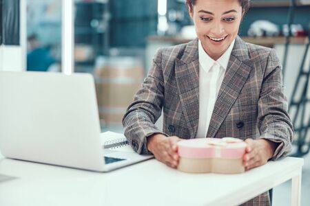 Feeling excited by amazing little present stock photoの写真素材