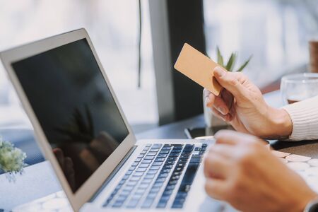 Cropped photo of male worker keeping sheet of papaer. Business conceptの写真素材
