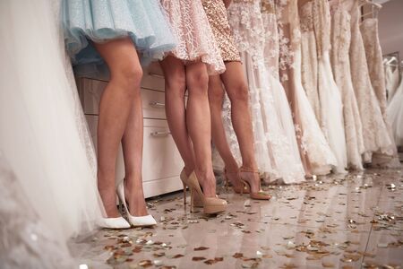 Low angle of elegant ladies legs in wedding salonの写真素材
