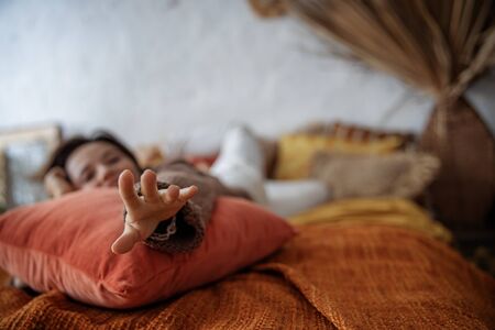 Funny woman relaxing on her day off at homeの写真素材