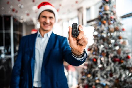 Man demonstrating a remote control car key fobの写真素材