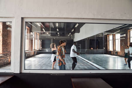 Modern ballet members during rehearsing in studioの写真素材