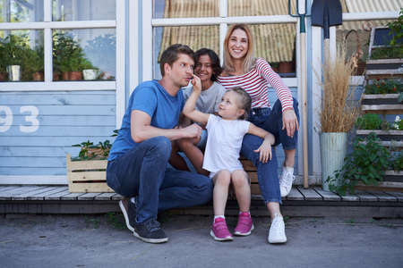 Happy family spending time together outside the house