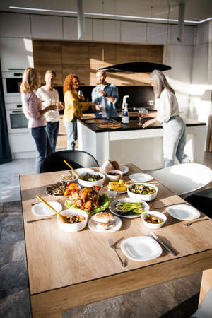 Beautiful table with food in a cozy homeの写真素材