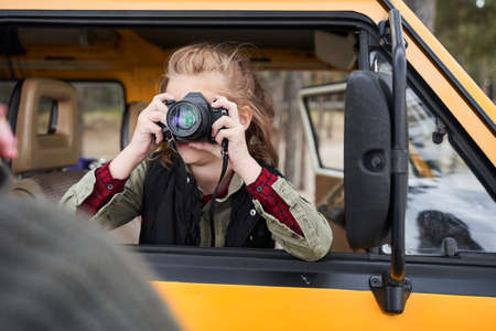 Girl shooting forest landscapesの写真素材