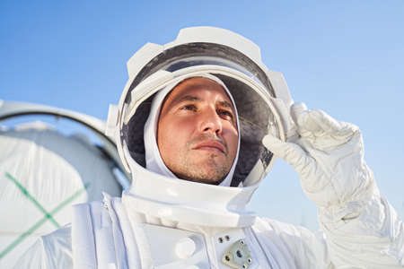 Male astronaut in space suit