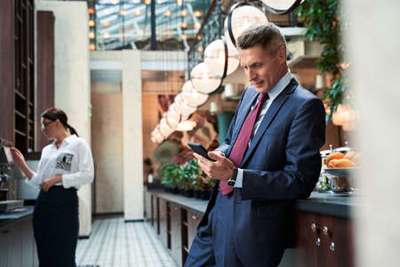 Businesswoman and businessman during coffee break