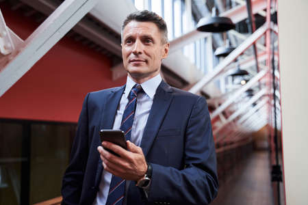 Portrait of elegant businessman in suit