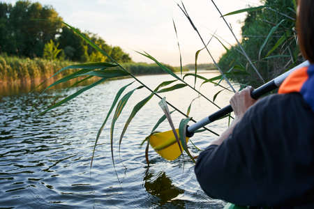 Close up shot of guy in kayakの写真素材