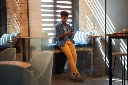 Man communicating by smartphone