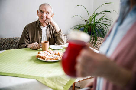 Portrait of senior man drinking teaの写真素材