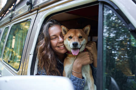 Woman embracing her pet