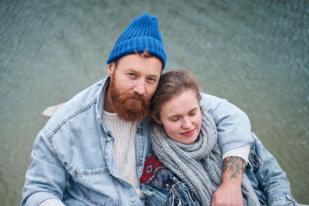 Guy hugging his girlfriend