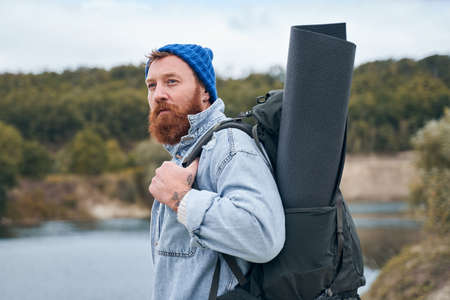 Hiker man walking in the natureの写真素材