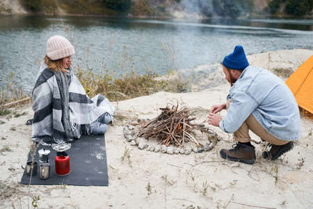 Man fan the fireの写真素材