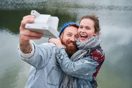 Couple making selfieの写真素材