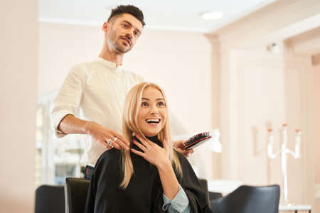 Woman discussing hairstylingの写真素材