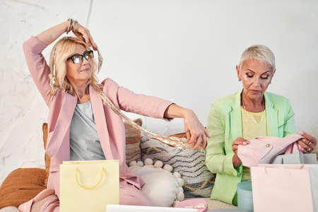 Woman trying on a fashionable scarf