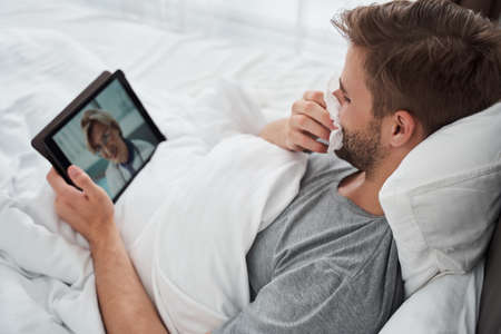 Man chatting with his therapist