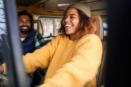 Two friends driving motorhomeの写真素材