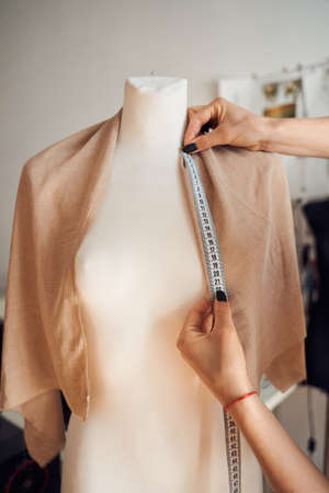 Woman taking measurements