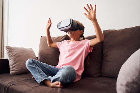 Girl wearing VR technology device