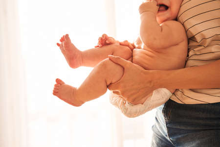 Woman playing with her sonの写真素材