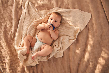 Newborn baby taking sun bathの写真素材