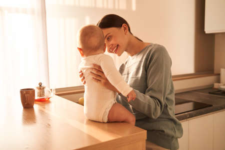 Mother embracing with her babyの写真素材