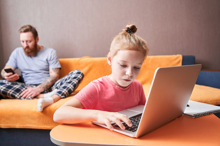 Child is sitting at desk