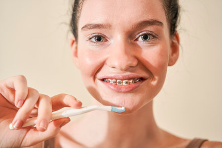 Women brushing her teethの写真素材