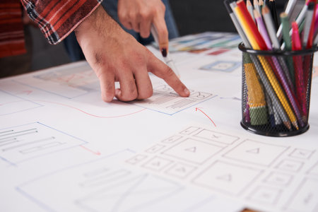 Specialist creating a prototype user experience interface