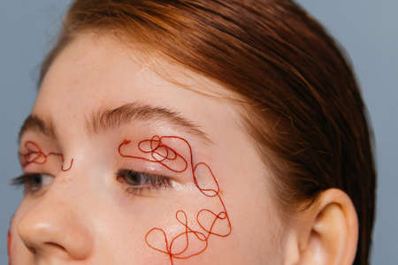 Healthy beauty woman looking away isolated on backgroundの写真素材