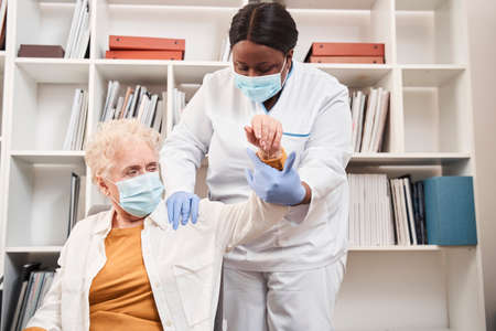 Woman while making regular check up during  virus